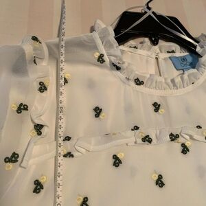 CeCe ruffle neck and sleeve blouse in Soft Ecru